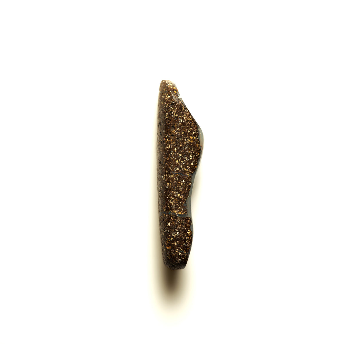 A polished brown stone side profile, shown vertically on a clean white background.