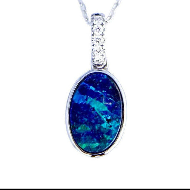 Necklace with a blue pendant on a light purple background