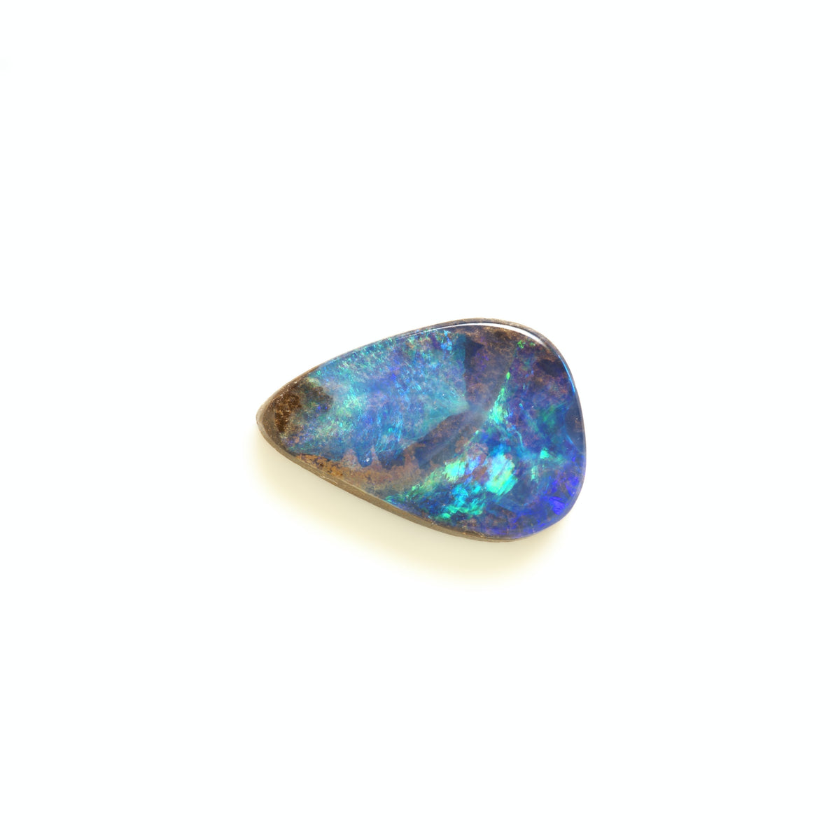 A polished teardrop-shaped iridescent opal gemstone showing vibrant blue, green, and purple flashes against a white background.